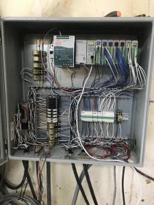 carefully organized equipment rack with many cables